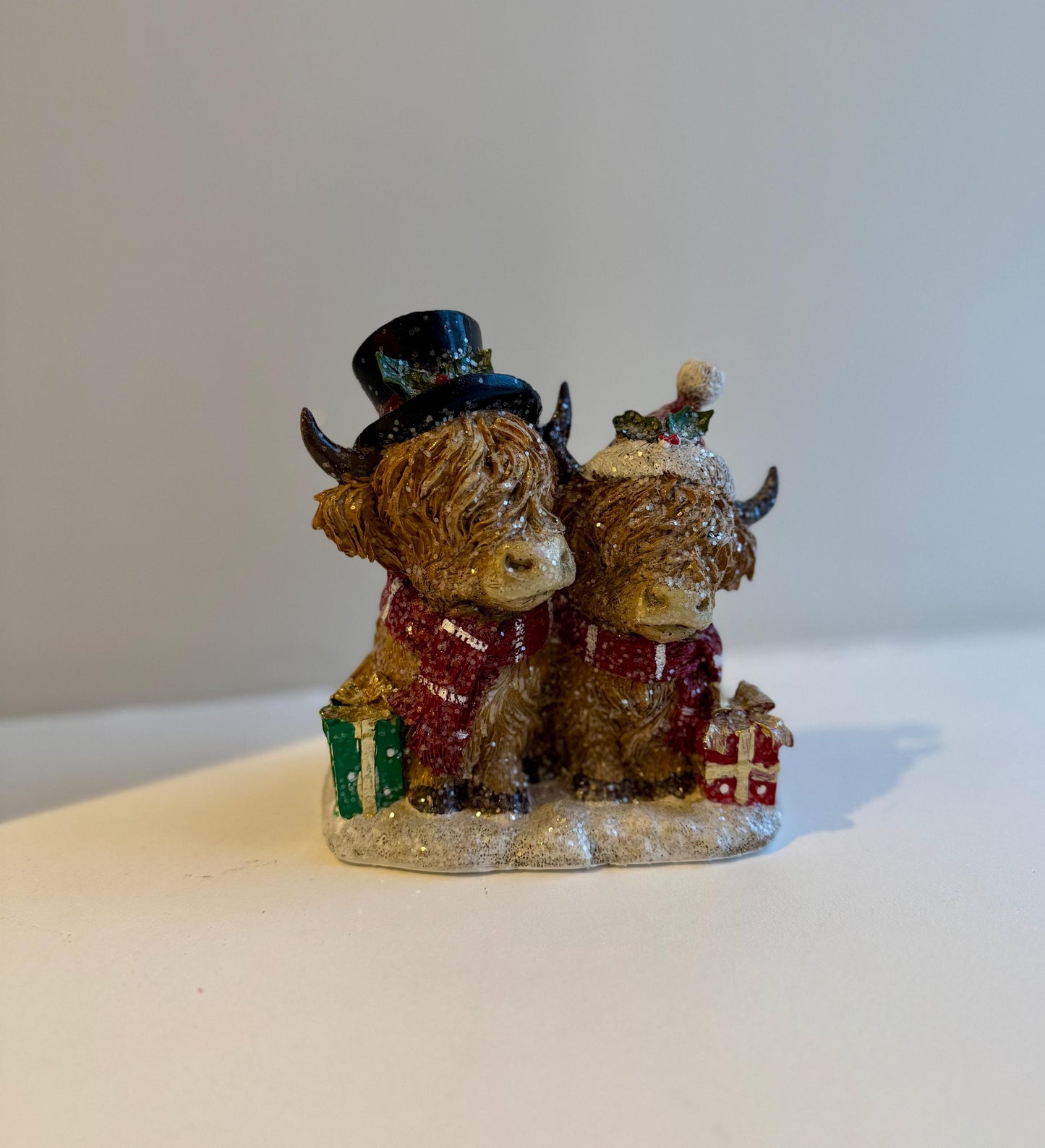 Highland Cow Christmas Ornament - Festive Figurine with Christmas Hat