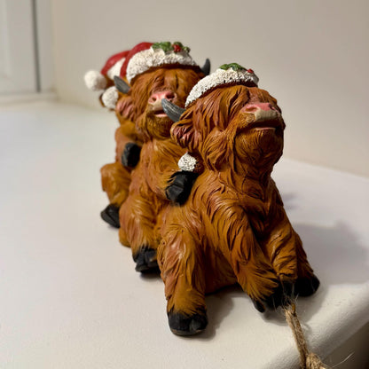 Helpful Highland Cow Christmas Ornament - Fun Festive Figurine