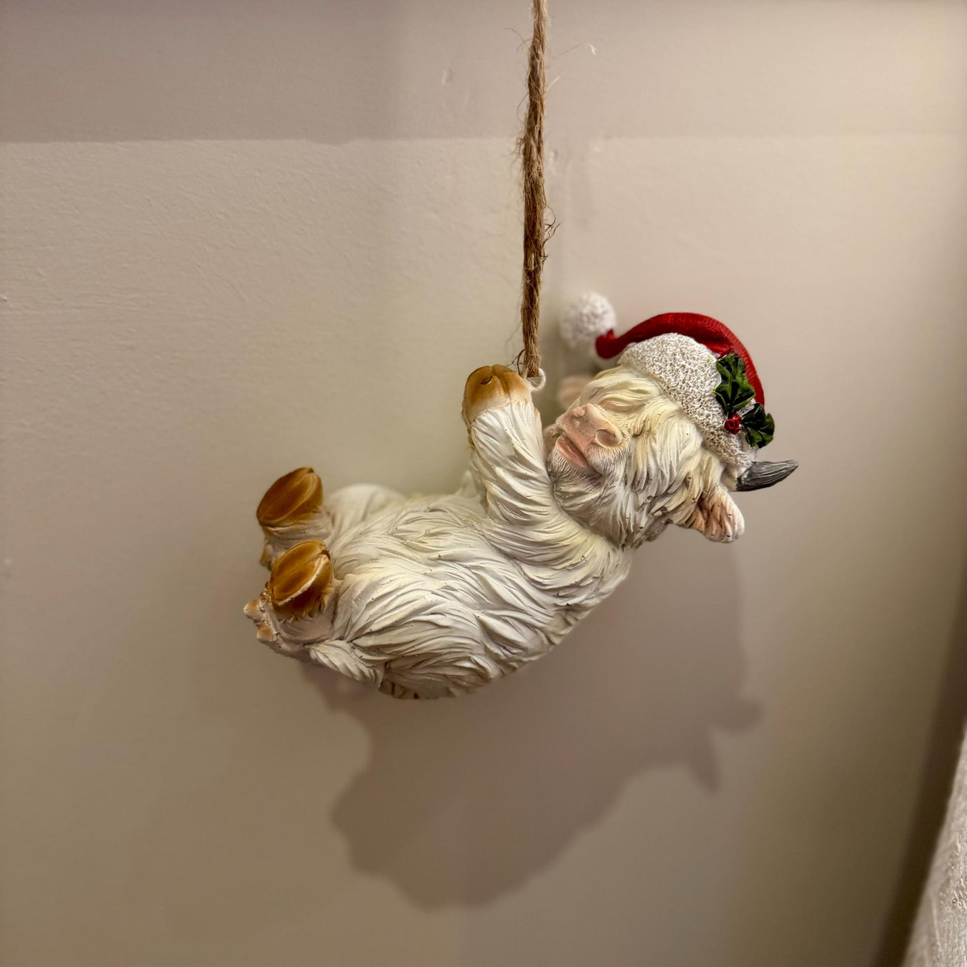 Helpful Highland Cow Christmas Ornament - Fun Festive Figurine