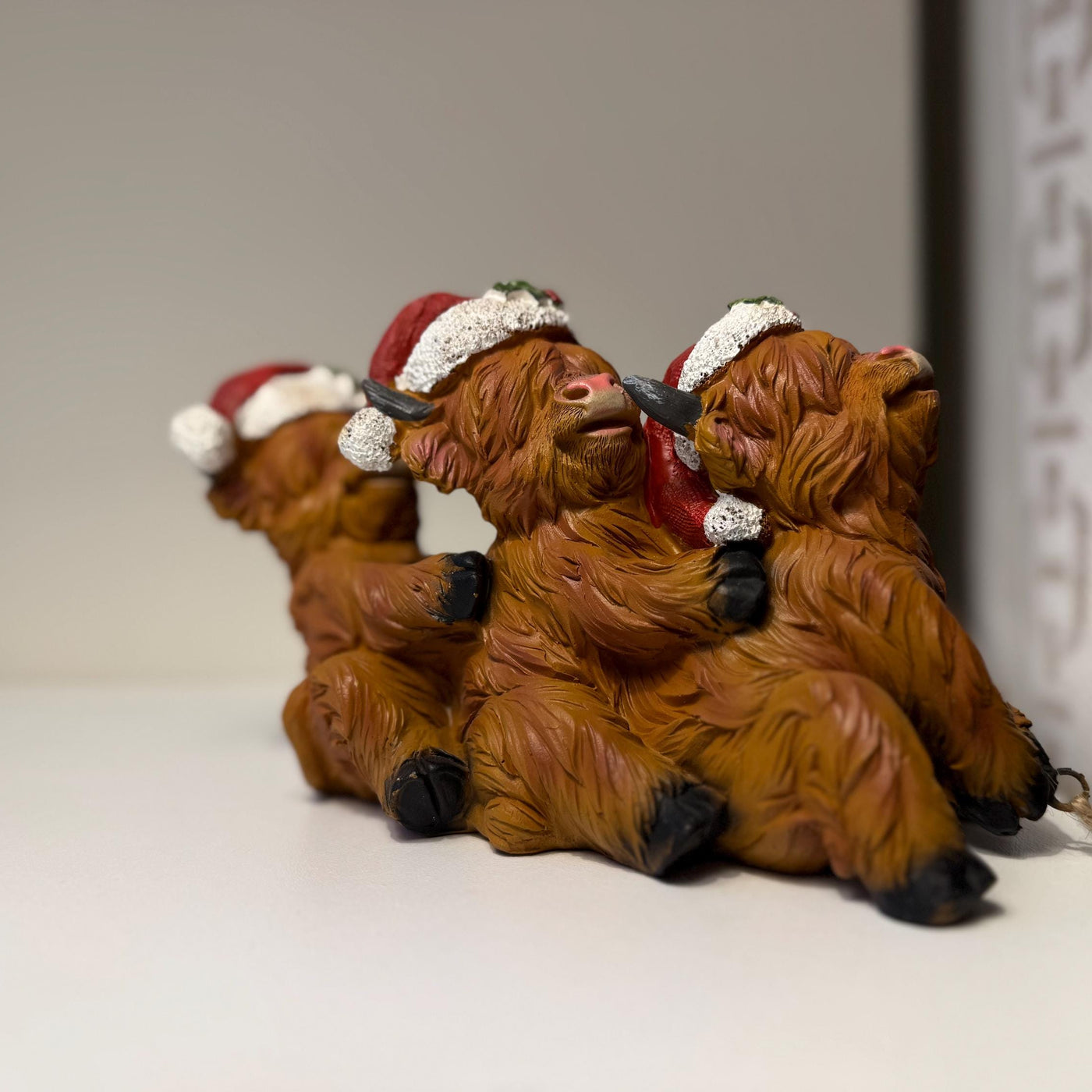 Helpful Highland Cow Christmas Ornament - Fun Festive Figurine